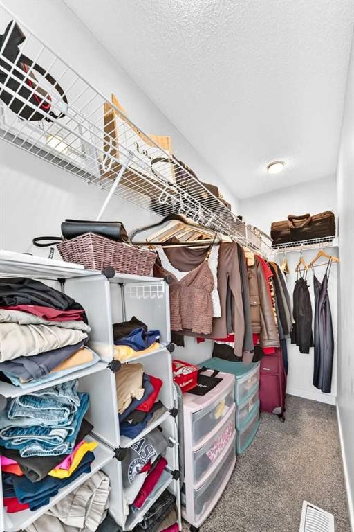 112 Carrington Boulevard Nw, Calgary, AB - Indoor With Storage