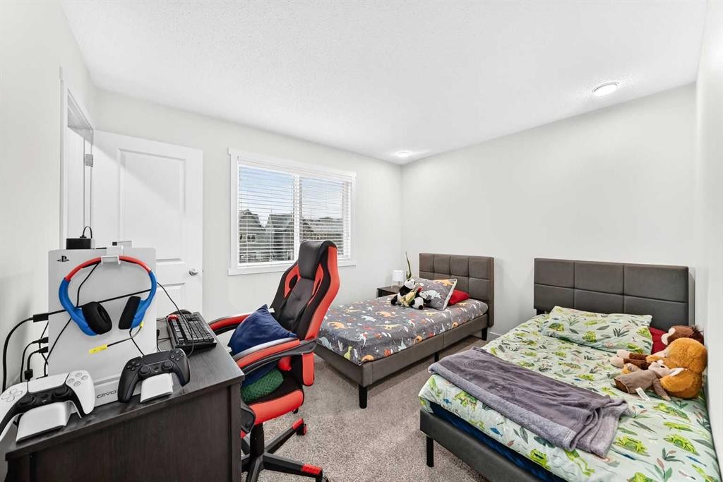 112 Carrington Boulevard Nw, Calgary, AB - Indoor Photo Showing Bedroom