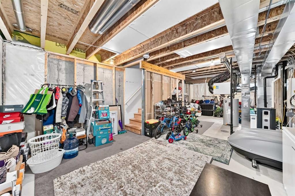 112 Carrington Boulevard Nw, Calgary, AB - Indoor Photo Showing Basement