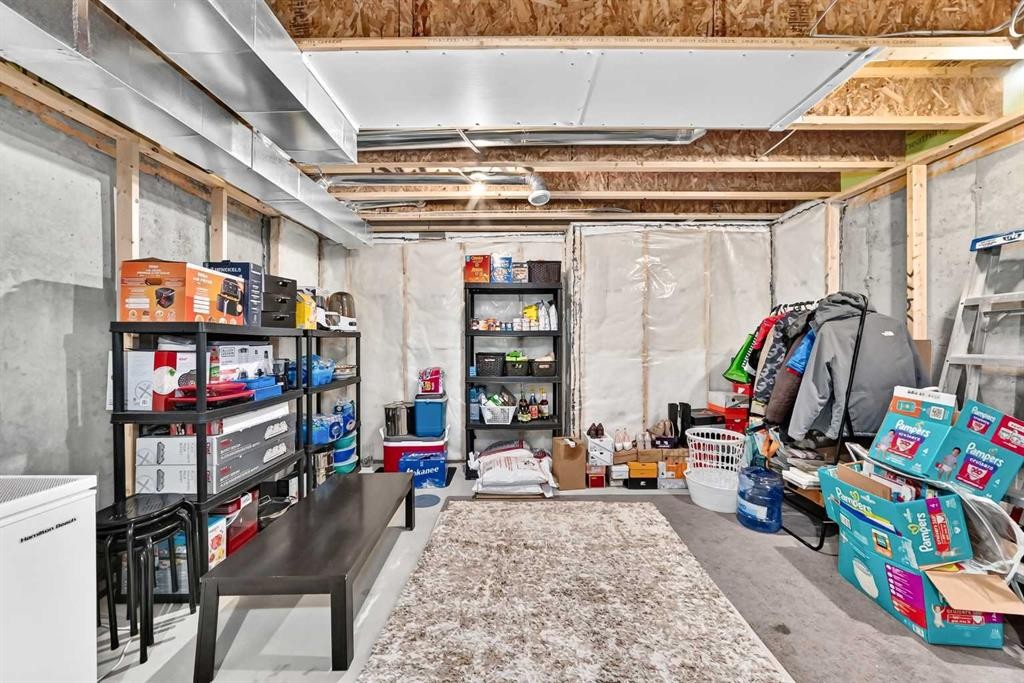 112 Carrington Boulevard Nw, Calgary, AB - Indoor Photo Showing Basement