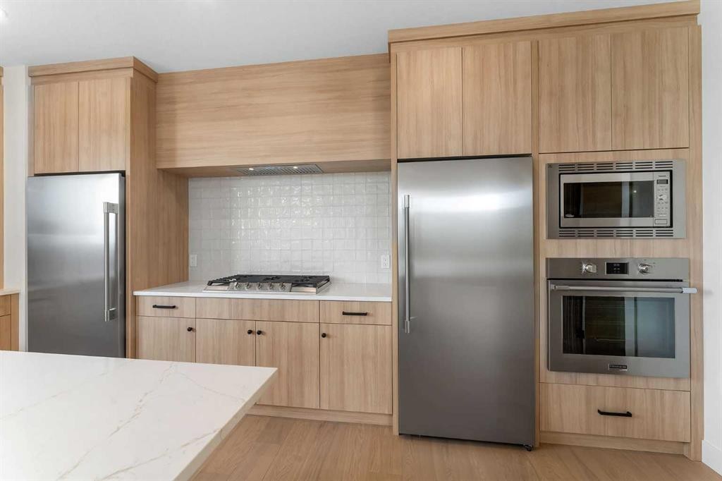 99 South Shore Road, Chestermere, AB - Indoor Photo Showing Kitchen With Stainless Steel Kitchen