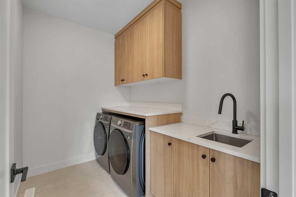 99 South Shore Road, Chestermere, AB - Indoor Photo Showing Laundry Room