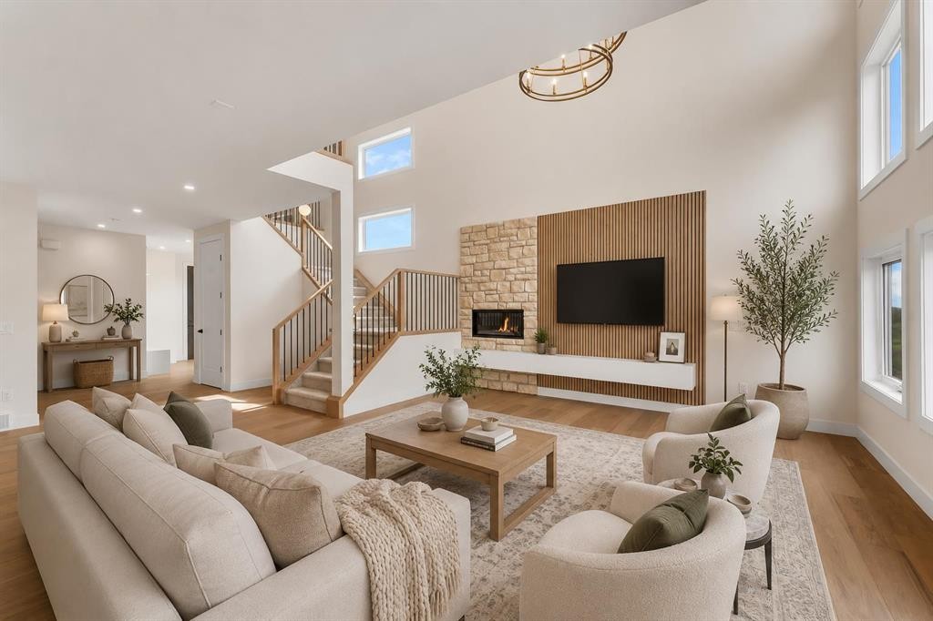 99 South Shore Road, Chestermere, AB - Indoor Photo Showing Living Room With Fireplace