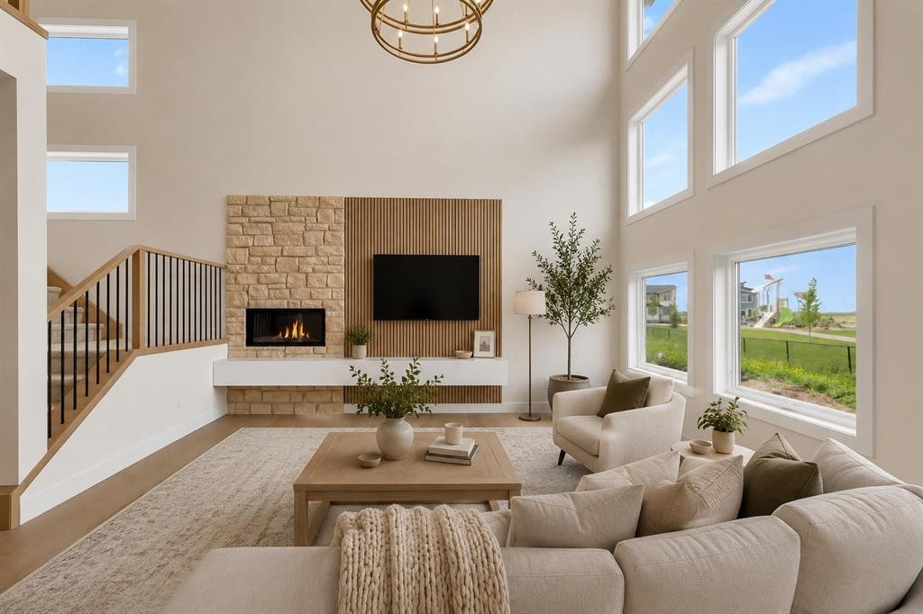 99 South Shore Road, Chestermere, AB - Indoor Photo Showing Living Room With Fireplace