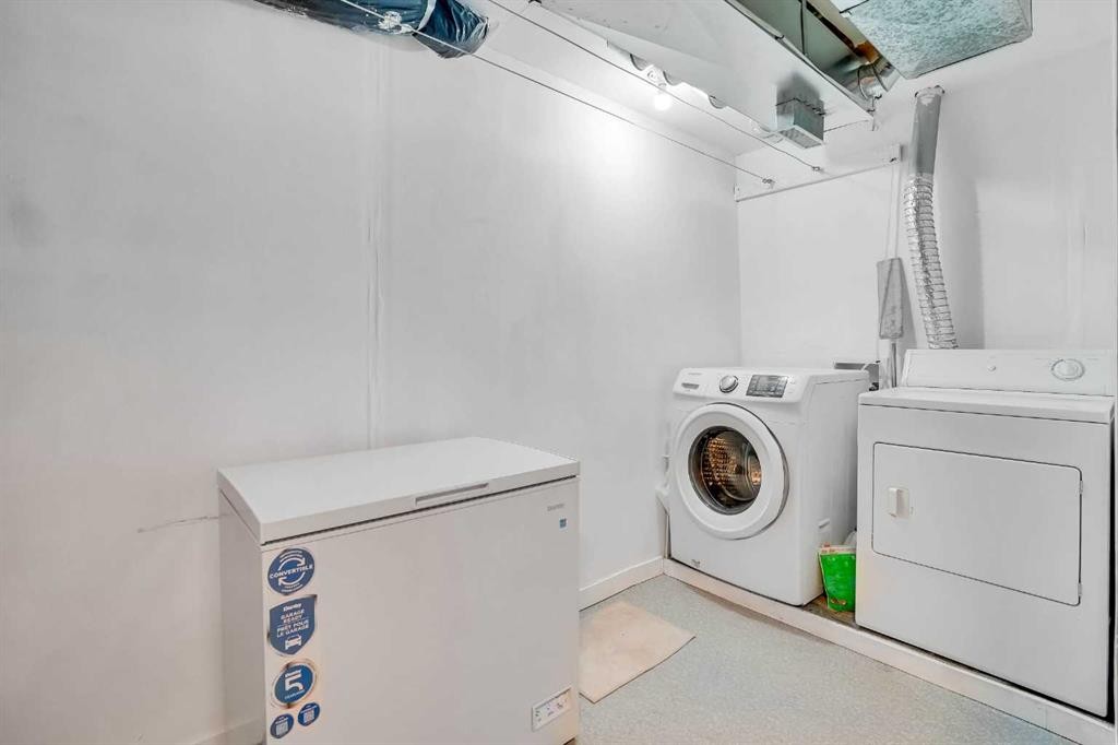142 Panatella Park Nw, Calgary, AB - Indoor Photo Showing Laundry Room