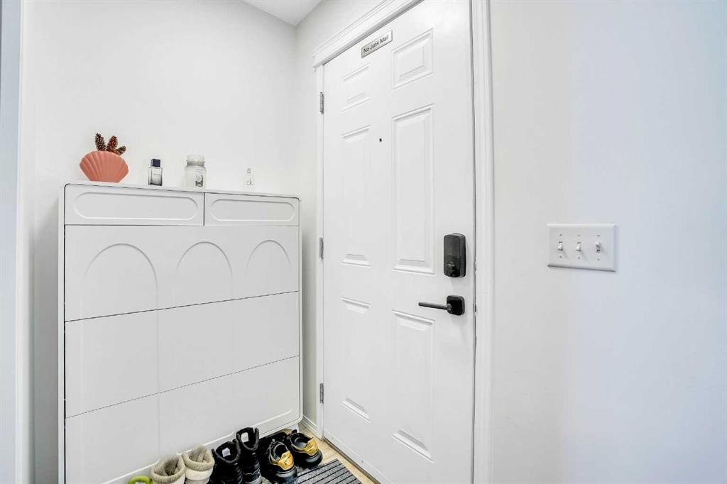 142 Panatella Park Nw, Calgary, AB - Indoor Photo Showing Laundry Room