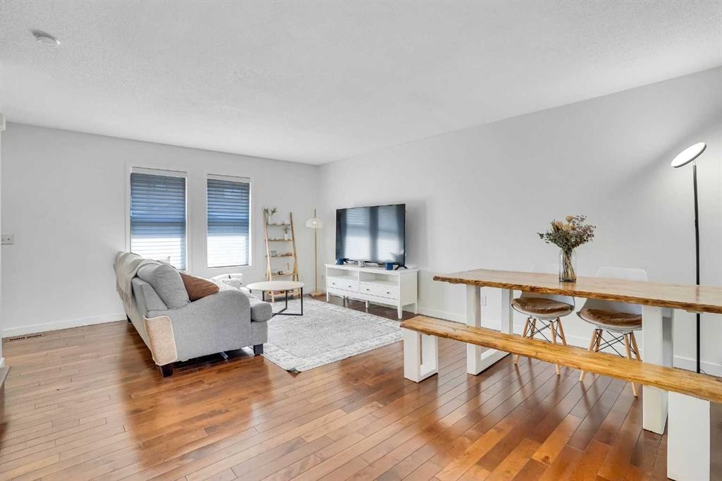 142 Panatella Park Nw, Calgary, AB - Indoor Photo Showing Living Room