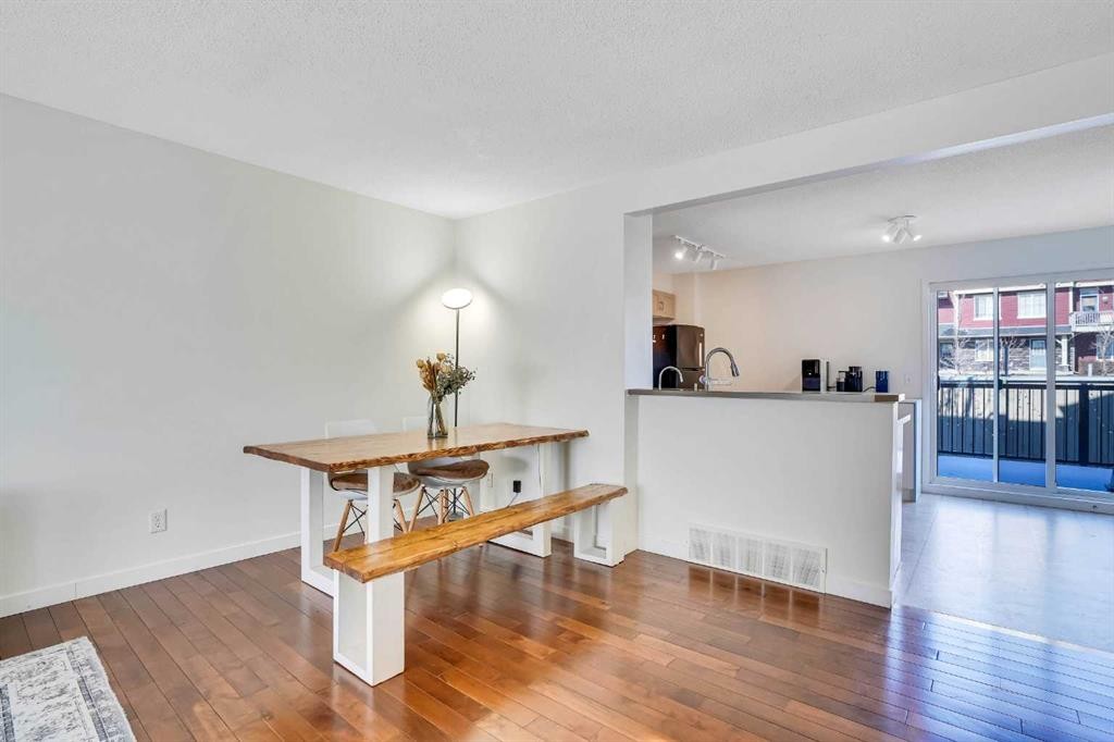 142 Panatella Park Nw, Calgary, AB - Indoor Photo Showing Dining Room