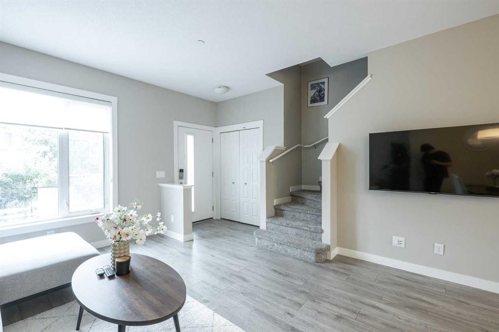 156 Livingston Common Ne, Calgary, AB - Indoor Photo Showing Living Room