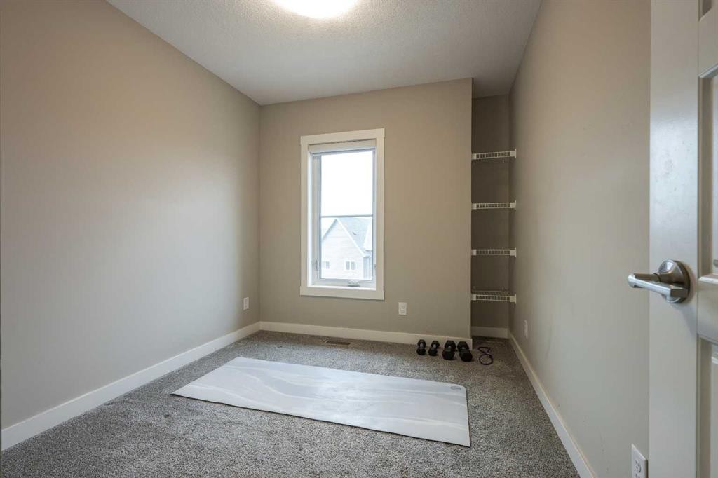 156 Livingston Common Ne, Calgary, AB - Indoor Photo Showing Other Room