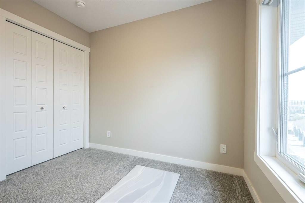 156 Livingston Common Ne, Calgary, AB - Indoor Photo Showing Other Room