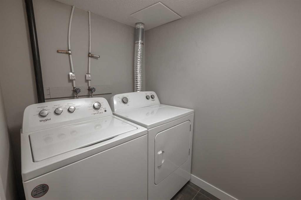 156 Livingston Common Ne, Calgary, AB - Indoor Photo Showing Laundry Room