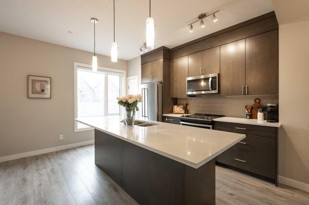 156 Livingston Common Ne, Calgary, AB - Indoor Photo Showing Kitchen With Upgraded Kitchen