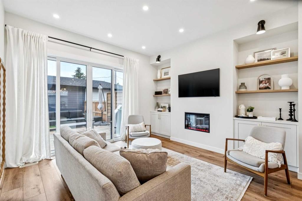 1329 Regal Crescent Ne, Calgary, AB - Indoor Photo Showing Living Room With Fireplace