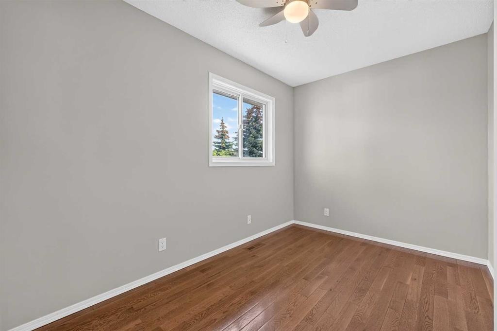 70 West Mackay Crescent, Cochrane, AB - Indoor Photo Showing Other Room