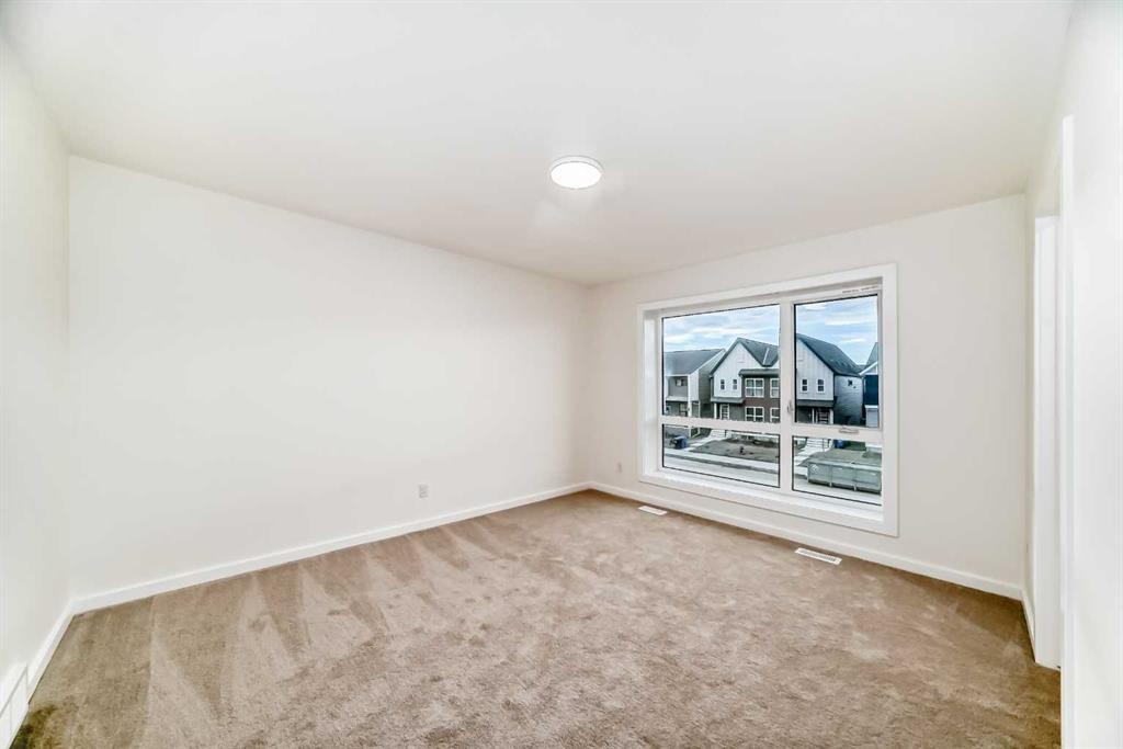 12 Savanna Place Ne, Calgary, AB - Indoor Photo Showing Other Room