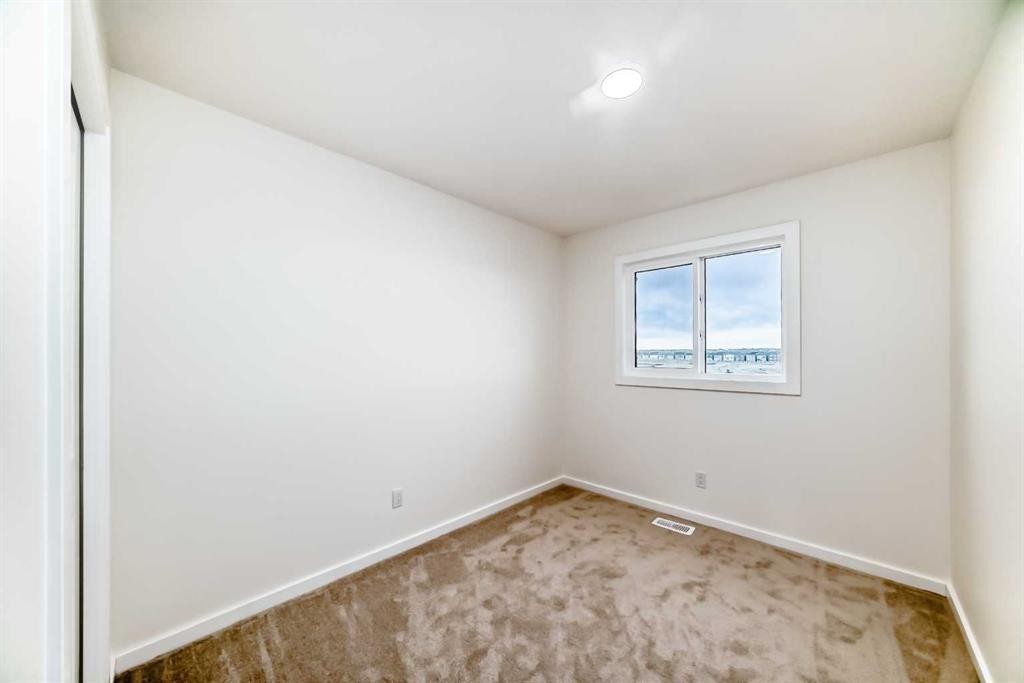 12 Savanna Place Ne, Calgary, AB - Indoor Photo Showing Other Room