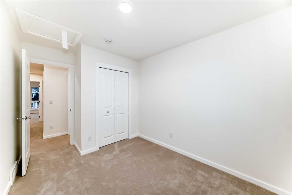 12 Savanna Place Ne, Calgary, AB - Indoor Photo Showing Other Room