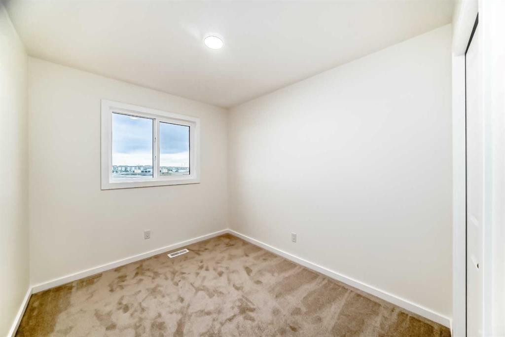 12 Savanna Place Ne, Calgary, AB - Indoor Photo Showing Other Room