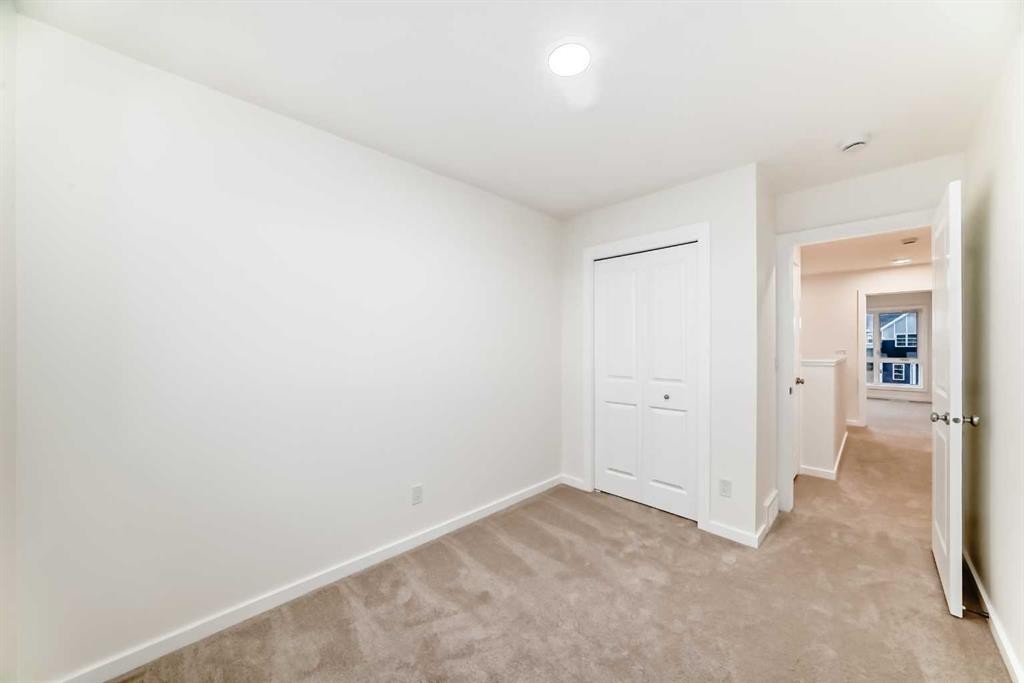 12 Savanna Place Ne, Calgary, AB - Indoor Photo Showing Other Room