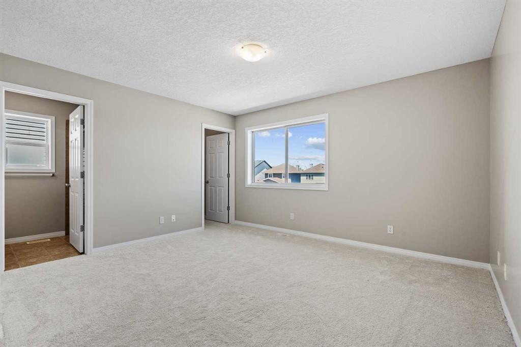 28 Saddlebrook Gardens Ne, Calgary, AB - Indoor Photo Showing Other Room