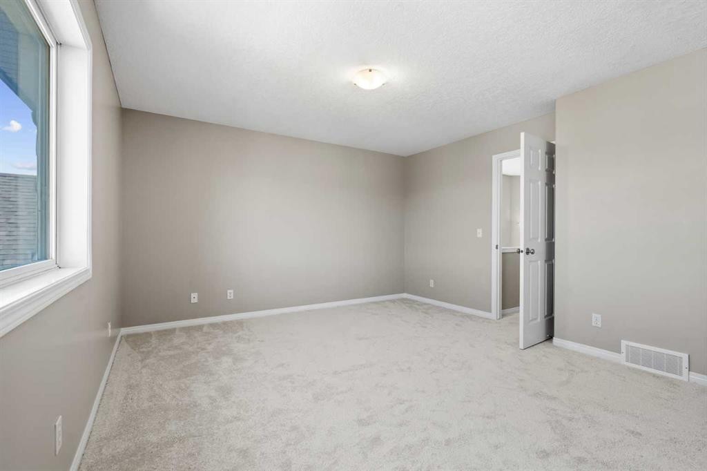 28 Saddlebrook Gardens Ne, Calgary, AB - Indoor Photo Showing Other Room