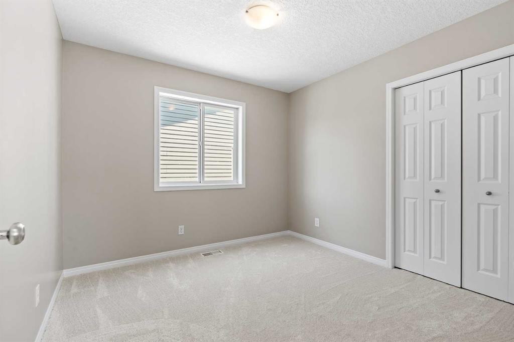 28 Saddlebrook Gardens Ne, Calgary, AB - Indoor Photo Showing Other Room
