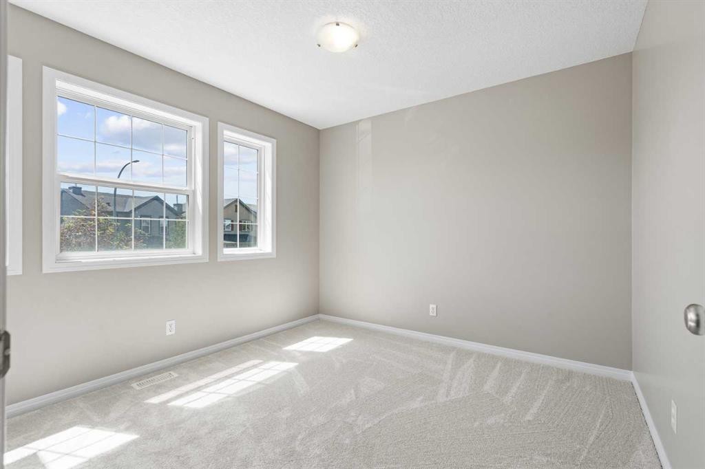 28 Saddlebrook Gardens Ne, Calgary, AB - Indoor Photo Showing Other Room