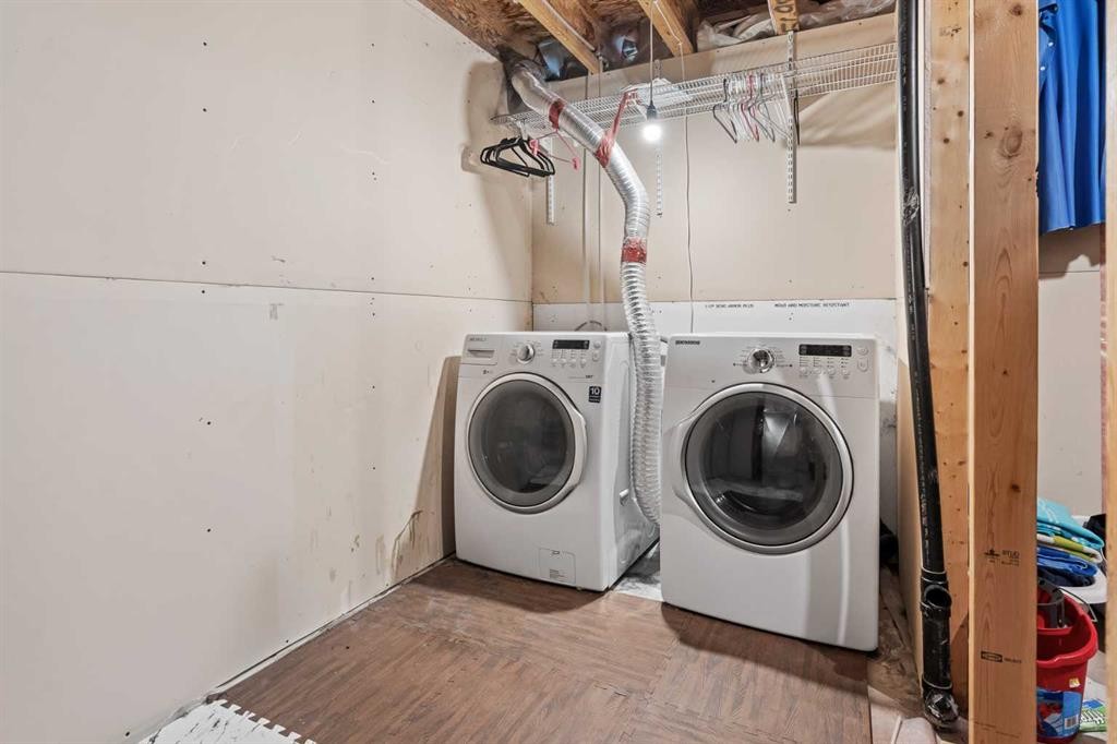 28 Saddlebrook Gardens Ne, Calgary, AB - Indoor Photo Showing Laundry Room