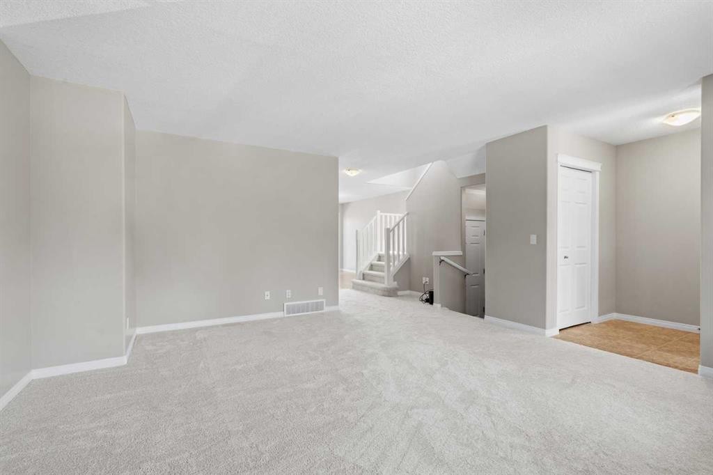 28 Saddlebrook Gardens Ne, Calgary, AB - Indoor Photo Showing Other Room