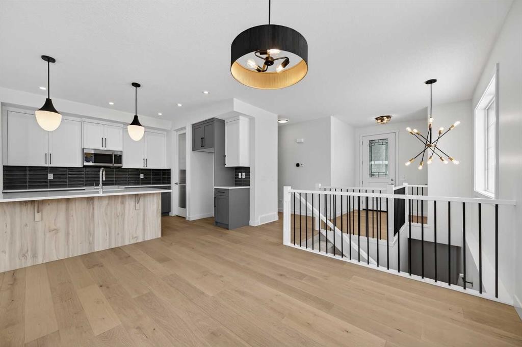 277 Waterford Way, Chestermere, AB - Indoor Photo Showing Kitchen With Upgraded Kitchen