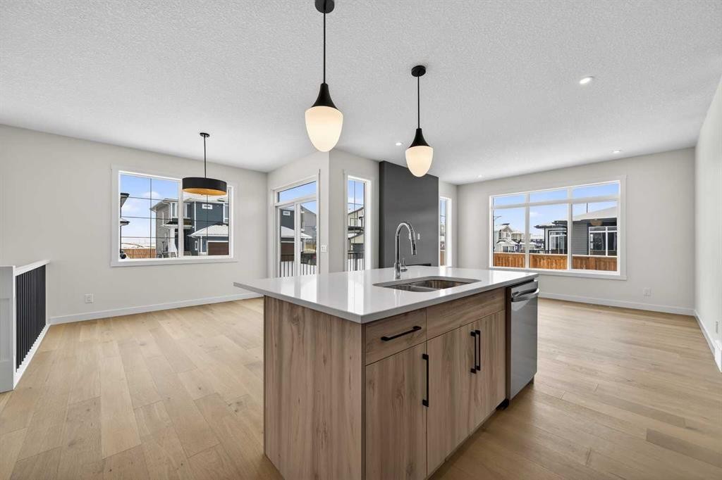 277 Waterford Way, Chestermere, AB - Indoor Photo Showing Kitchen With Double Sink