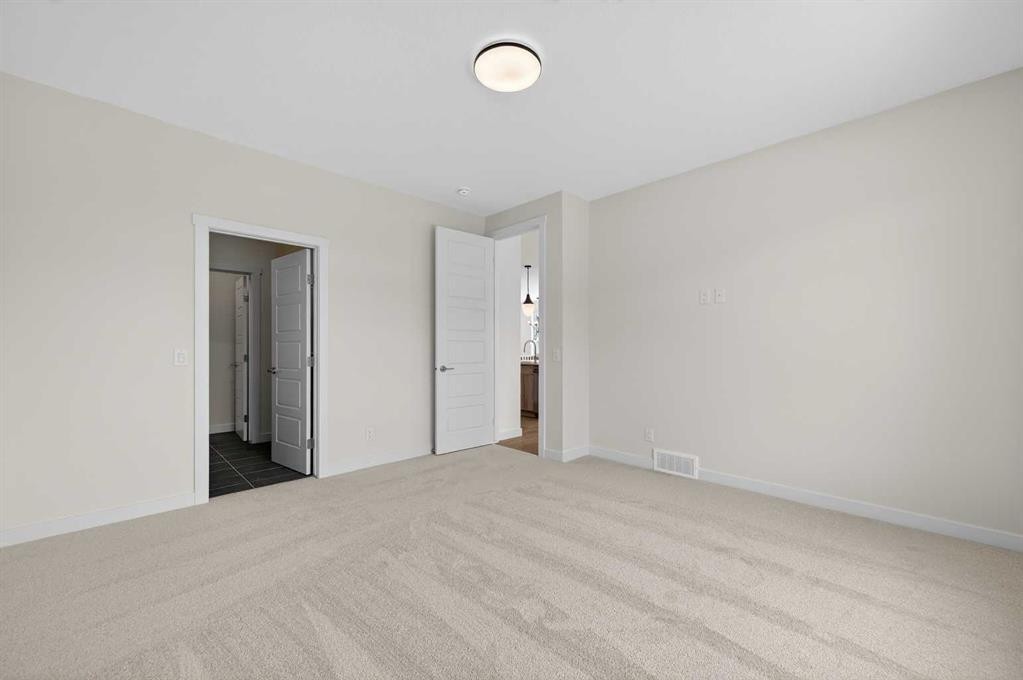 277 Waterford Way, Chestermere, AB - Indoor Photo Showing Other Room