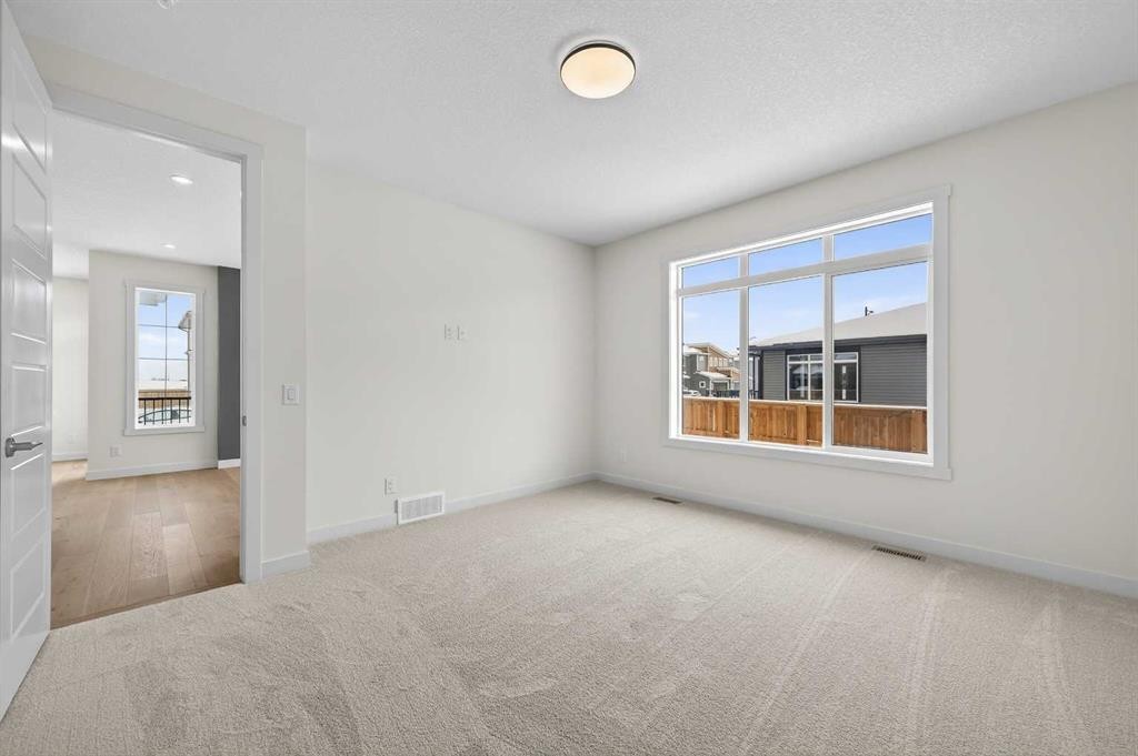 277 Waterford Way, Chestermere, AB - Indoor Photo Showing Other Room