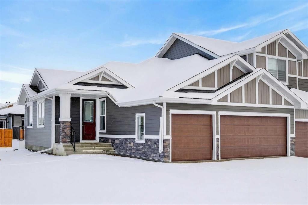 277 Waterford Way, Chestermere, AB - Outdoor With Facade
