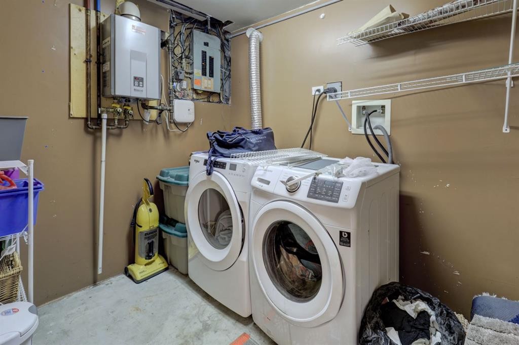 128 Pineland Place Ne, Calgary, AB - Indoor Photo Showing Laundry Room