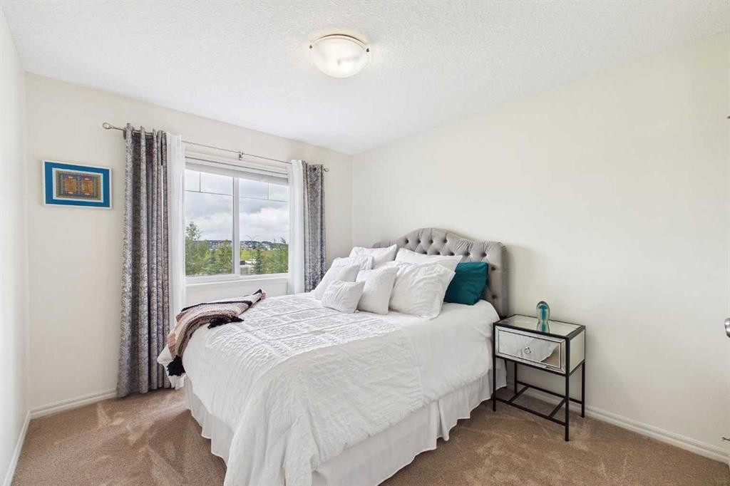 83 Redstone Gardens Ne, Calgary, AB - Indoor Photo Showing Bedroom
