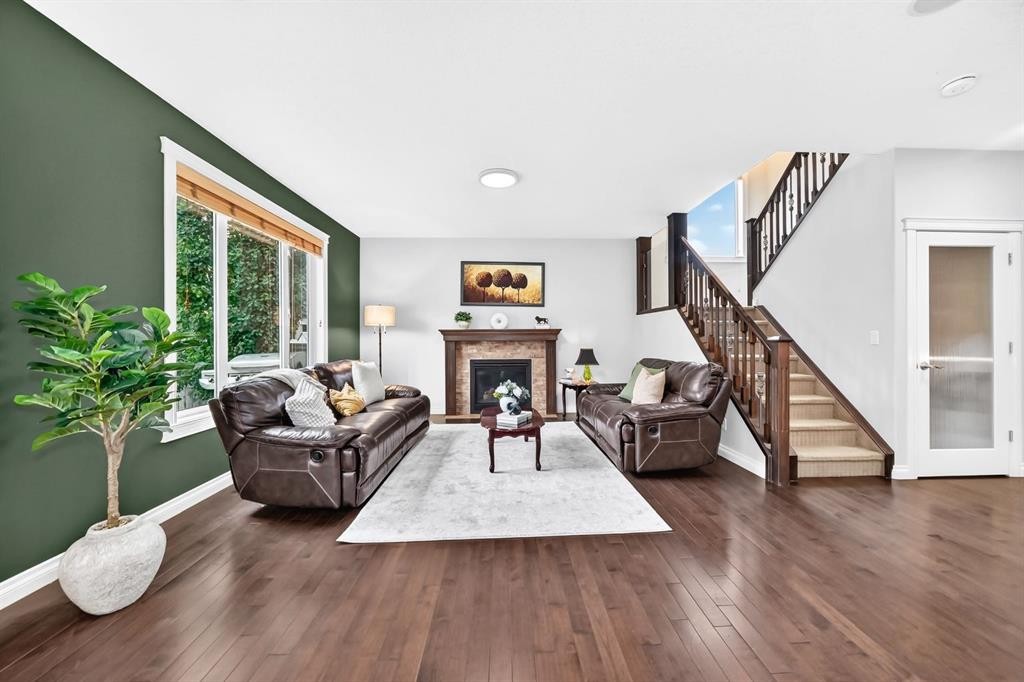 188 Magenta Crescent, Chestermere, AB - Indoor Photo Showing Living Room With Fireplace