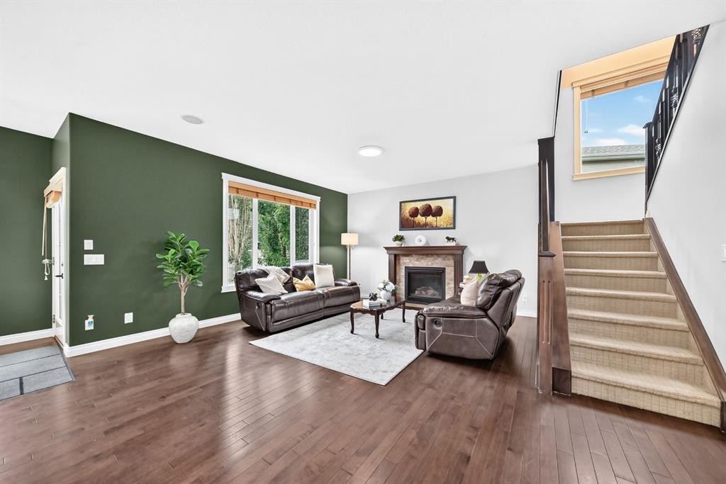 188 Magenta Crescent, Chestermere, AB - Indoor Photo Showing Living Room With Fireplace
