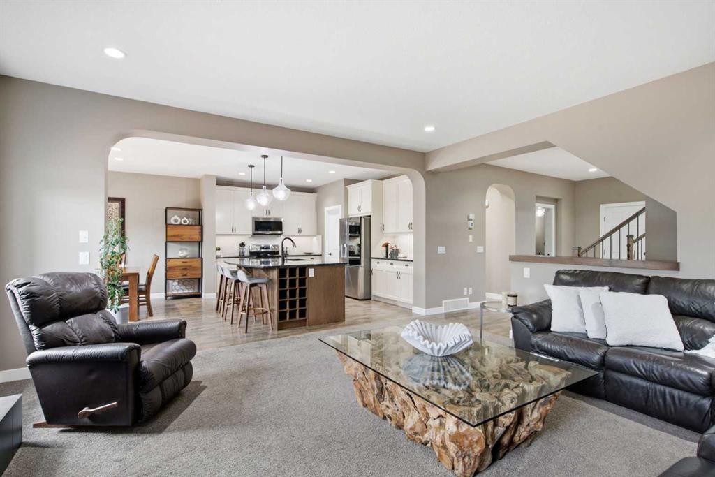 300 Aspenmere Way, Chestermere, AB - Indoor Photo Showing Living Room