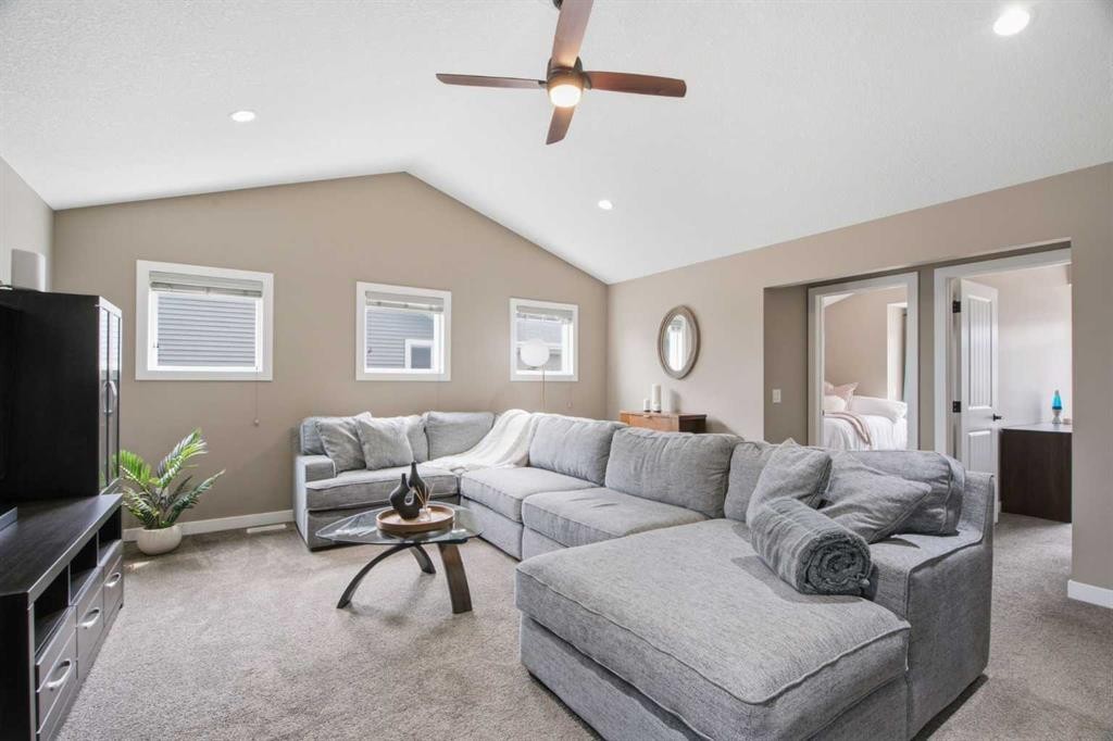 300 Aspenmere Way, Chestermere, AB - Indoor Photo Showing Living Room