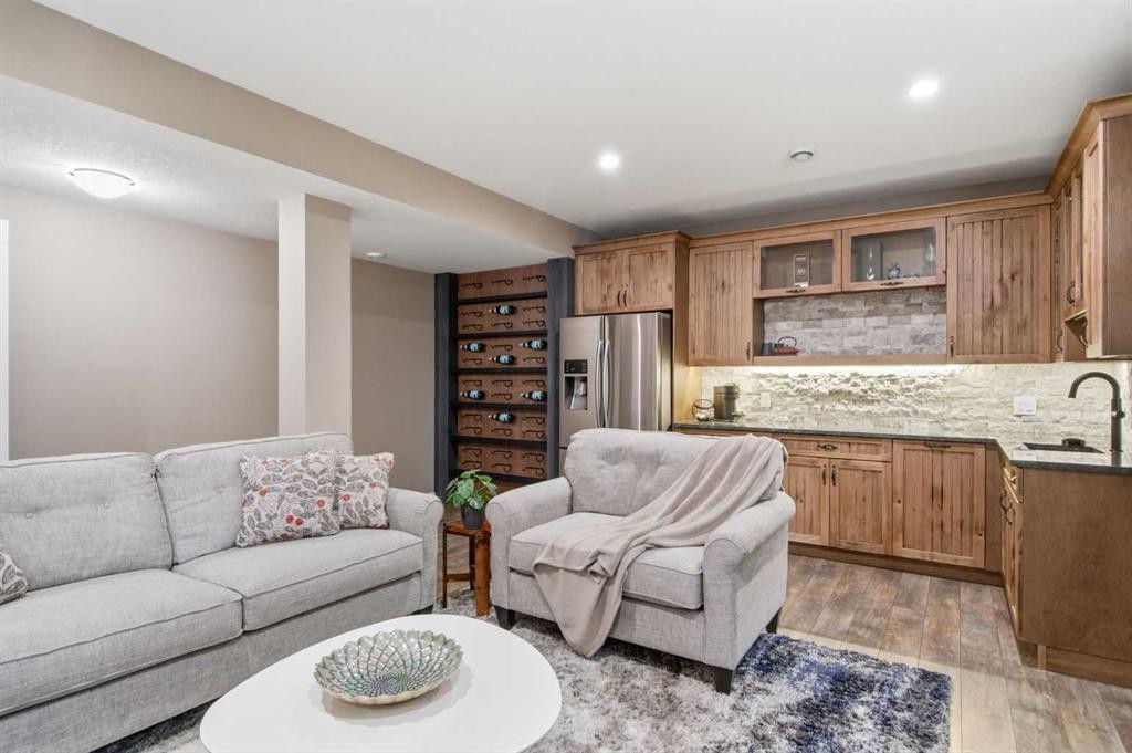 300 Aspenmere Way, Chestermere, AB - Indoor Photo Showing Living Room