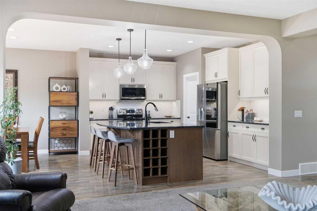 300 Aspenmere Way, Chestermere, AB - Indoor Photo Showing Kitchen With Stainless Steel Kitchen With Upgraded Kitchen