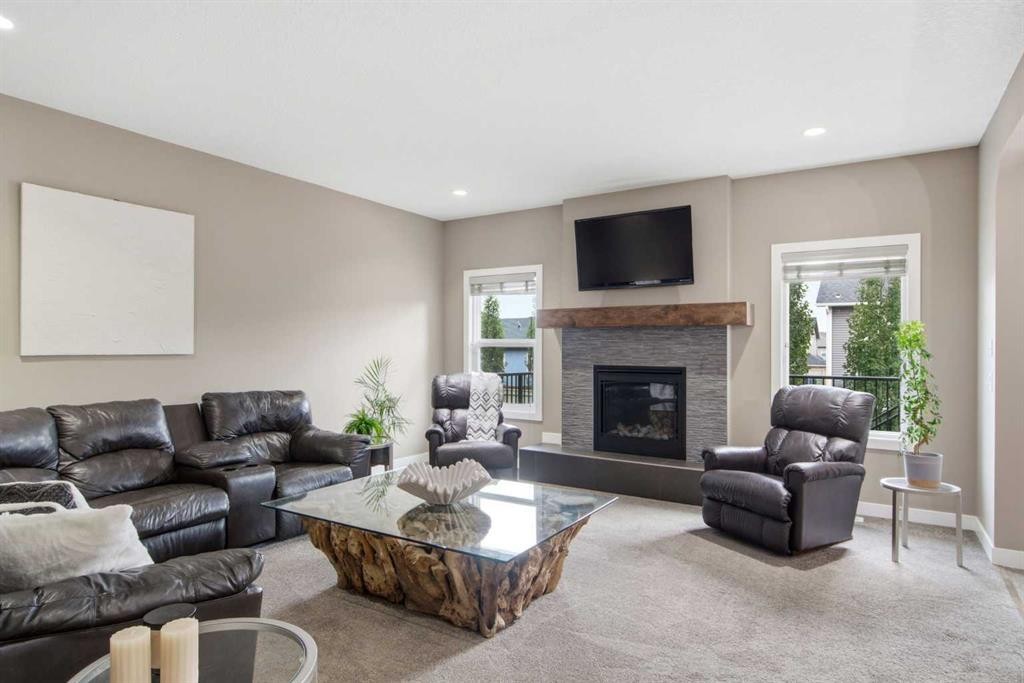 300 Aspenmere Way, Chestermere, AB - Indoor Photo Showing Living Room With Fireplace
