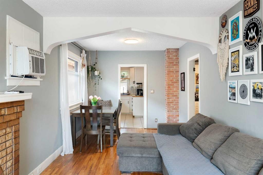 2115 14 Street Sw, Calgary, AB - Indoor Photo Showing Other Room With Fireplace