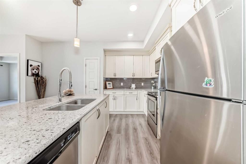 215-20 Seton Park Se, Calgary, AB - Indoor Photo Showing Kitchen With Double Sink With Upgraded Kitchen