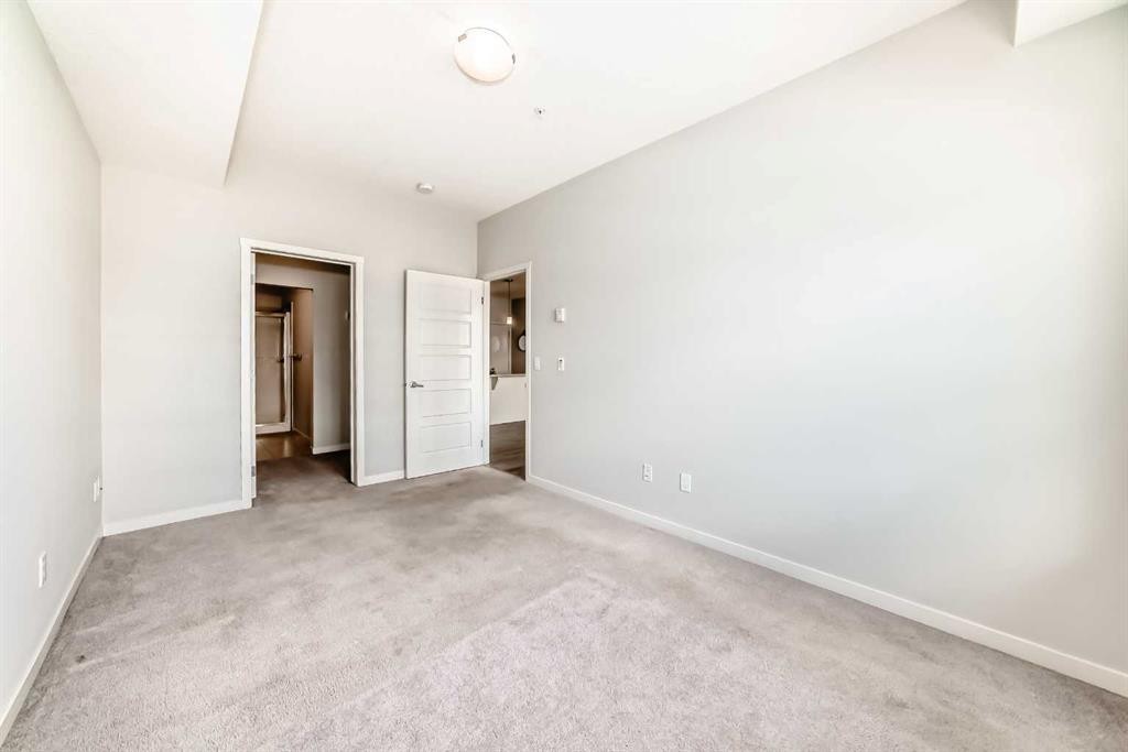 215-20 Seton Park Se, Calgary, AB - Indoor Photo Showing Other Room