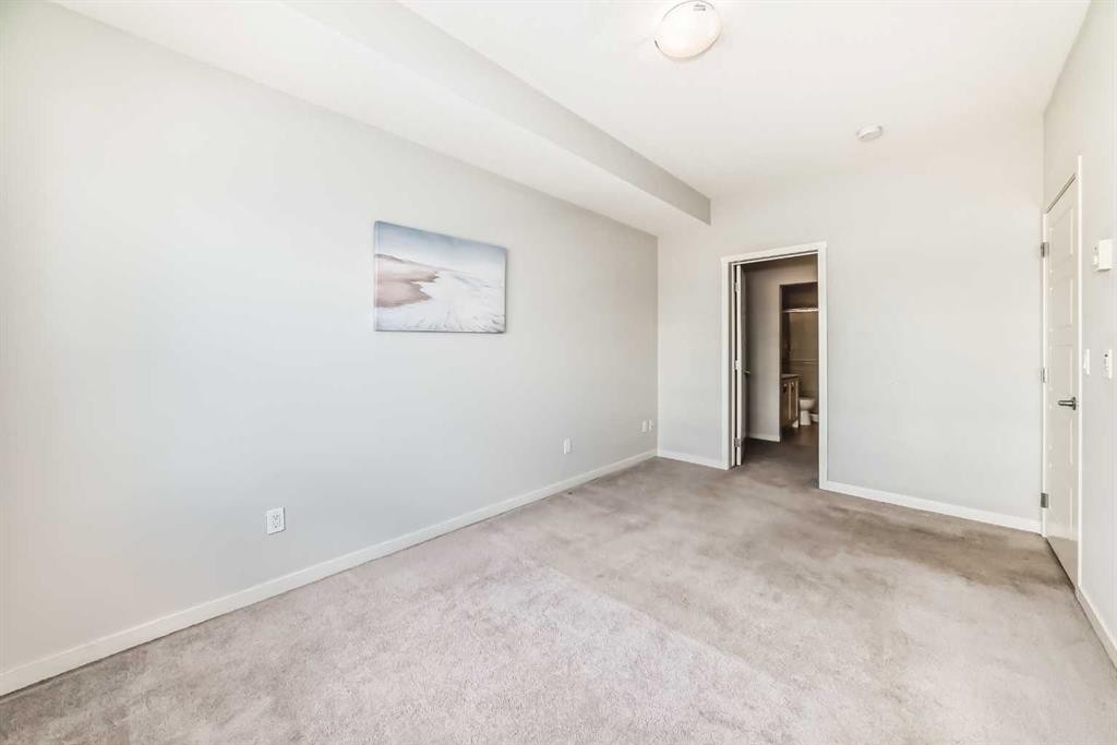 215-20 Seton Park Se, Calgary, AB - Indoor Photo Showing Other Room