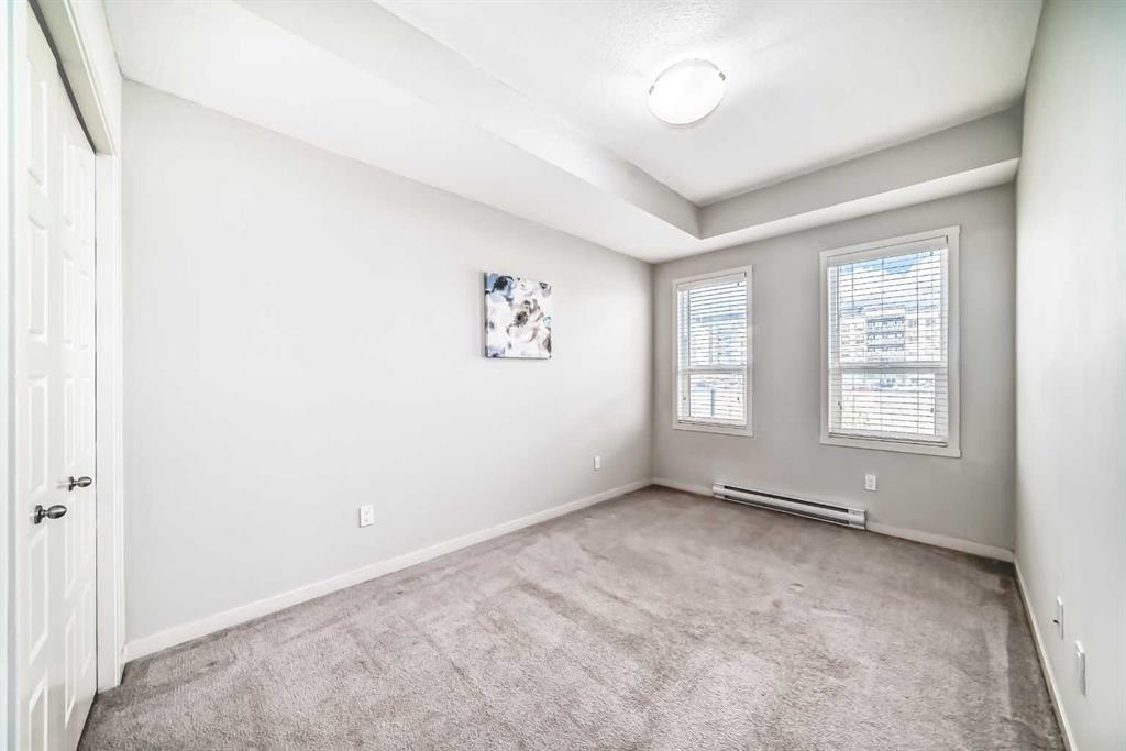 215-20 Seton Park Se, Calgary, AB - Indoor Photo Showing Other Room