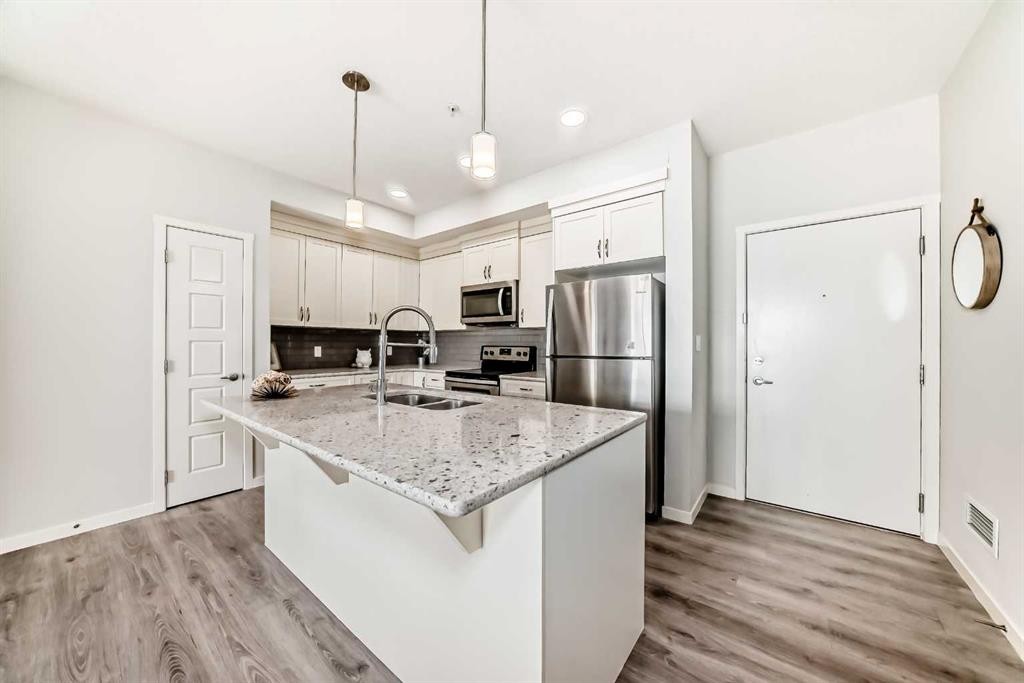 215-20 Seton Park Se, Calgary, AB - Indoor Photo Showing Kitchen With Double Sink With Upgraded Kitchen